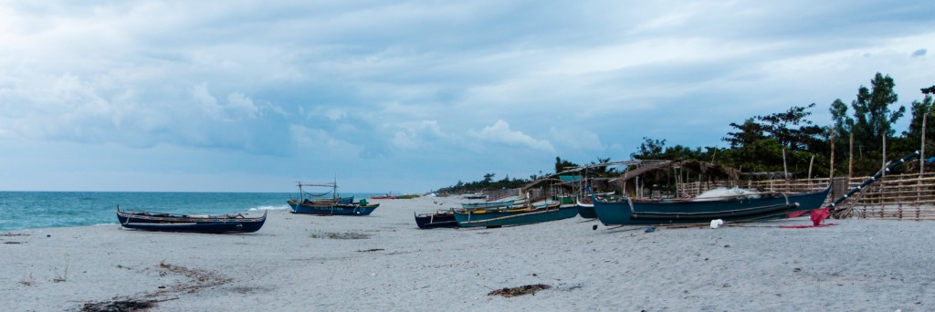 Fishing boats o n the beach at Laoag, Philippines