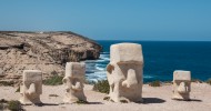 Sandstone sculptures with ocean and cliffs at Elliston, South Australia